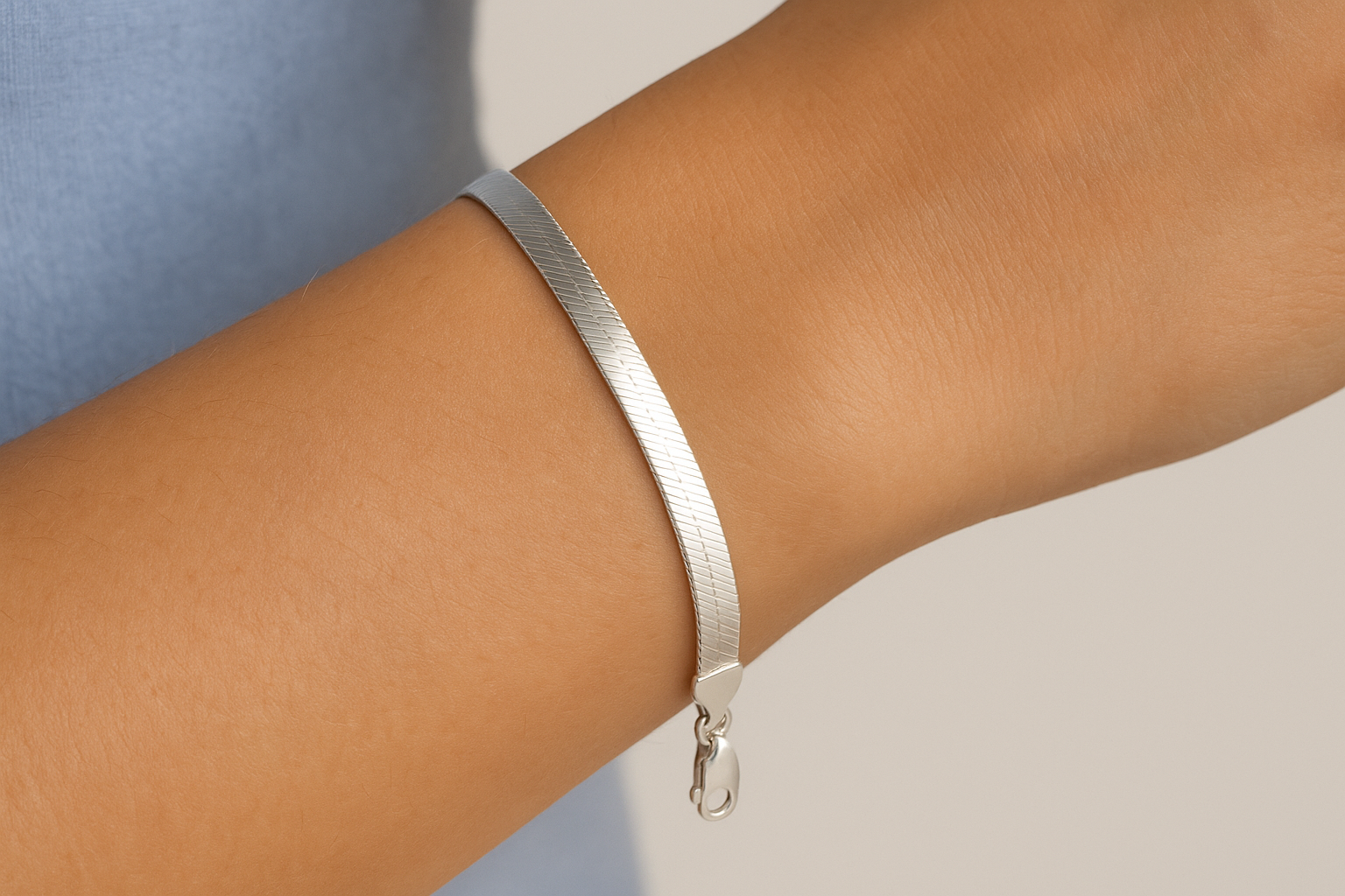 7. Kay Outlet sterling silver herringbone chain bracelet