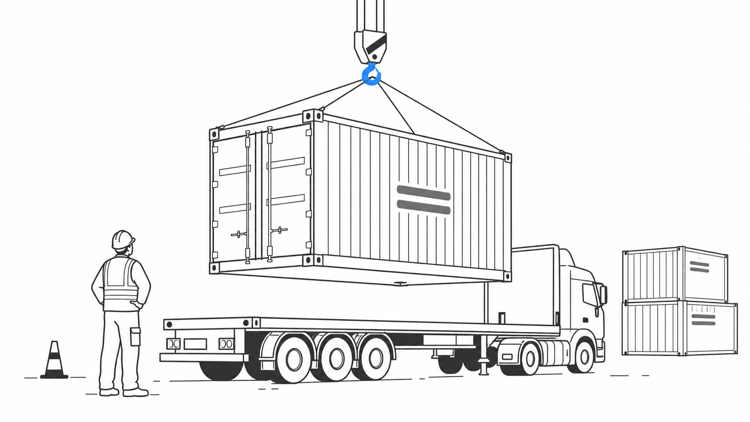 A shipping container being lowered by crane onto a flatbed truck at a job site.